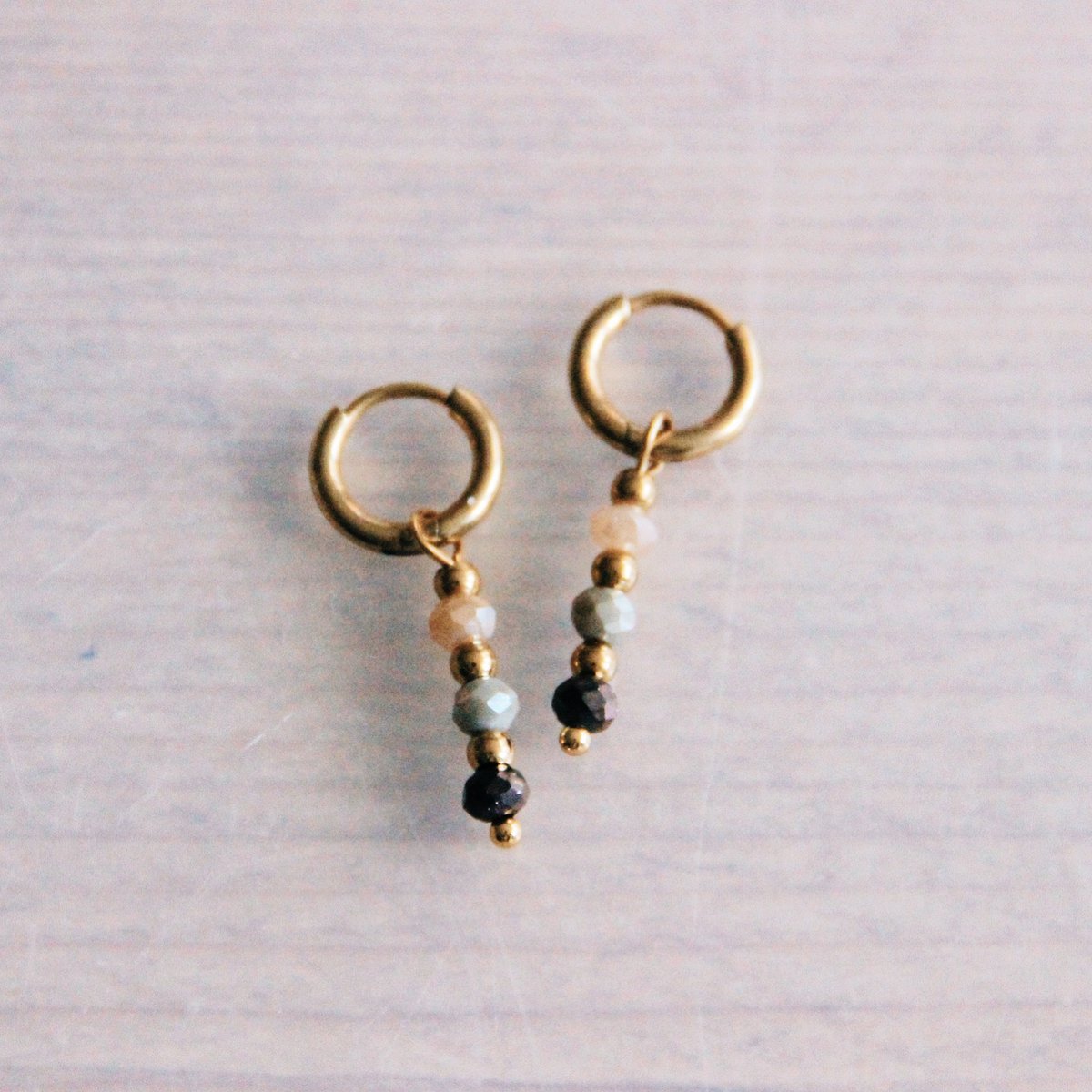 CB343: Stainless steel hoop earrings with facets - taupe